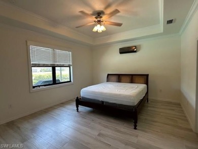 All Impact Windows, custom pool home is on a corner lot with a on Gateway Golf and Country Club in Florida - for sale on GolfHomes.com, golf home, golf lot