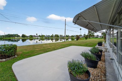 Presenting this custom-built residence overlooking the tranquil on North Lakes Golf Course in Florida - for sale on GolfHomes.com, golf home, golf lot
