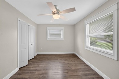 Presenting this custom-built residence overlooking the tranquil on North Lakes Golf Course in Florida - for sale on GolfHomes.com, golf home, golf lot