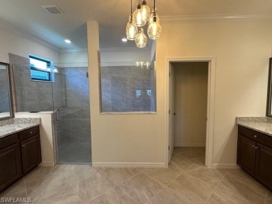 All Impact Windows, custom pool home is on a corner lot with a on Gateway Golf and Country Club in Florida - for sale on GolfHomes.com, golf home, golf lot