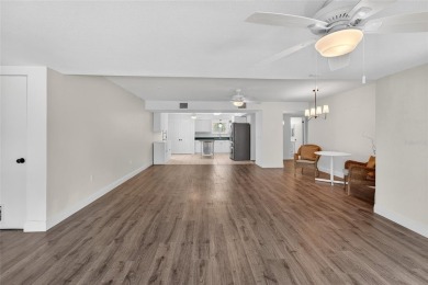 Presenting this custom-built residence overlooking the tranquil on North Lakes Golf Course in Florida - for sale on GolfHomes.com, golf home, golf lot