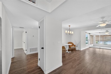 Presenting this custom-built residence overlooking the tranquil on North Lakes Golf Course in Florida - for sale on GolfHomes.com, golf home, golf lot