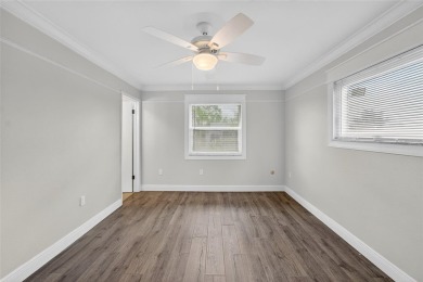 Presenting this custom-built residence overlooking the tranquil on North Lakes Golf Course in Florida - for sale on GolfHomes.com, golf home, golf lot
