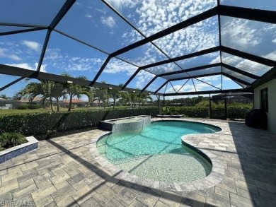 All Impact Windows, custom pool home is on a corner lot with a on Gateway Golf and Country Club in Florida - for sale on GolfHomes.com, golf home, golf lot