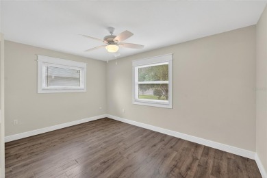 Presenting this custom-built residence overlooking the tranquil on North Lakes Golf Course in Florida - for sale on GolfHomes.com, golf home, golf lot