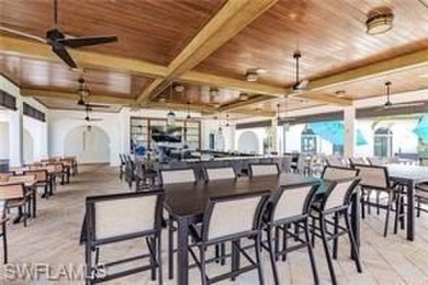All Impact Windows, custom pool home is on a corner lot with a on Gateway Golf and Country Club in Florida - for sale on GolfHomes.com, golf home, golf lot
