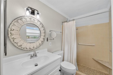 Presenting this custom-built residence overlooking the tranquil on North Lakes Golf Course in Florida - for sale on GolfHomes.com, golf home, golf lot