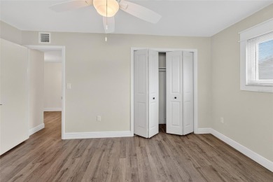 Presenting this custom-built residence overlooking the tranquil on North Lakes Golf Course in Florida - for sale on GolfHomes.com, golf home, golf lot