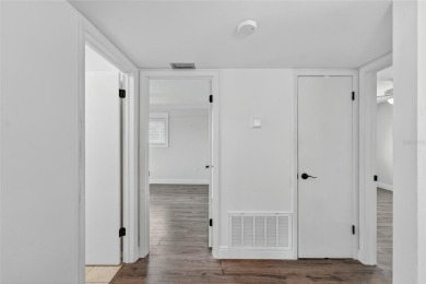 Presenting this custom-built residence overlooking the tranquil on North Lakes Golf Course in Florida - for sale on GolfHomes.com, golf home, golf lot