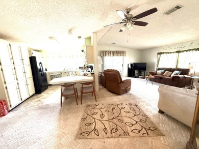 Move in ready at a great price!! This 2 bed, 2 bath home is on Whisperwood Golf Course in Florida - for sale on GolfHomes.com, golf home, golf lot