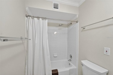 Presenting this custom-built residence overlooking the tranquil on North Lakes Golf Course in Florida - for sale on GolfHomes.com, golf home, golf lot