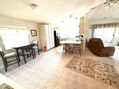 Move in ready at a great price!! This 2 bed, 2 bath home is on Whisperwood Golf Course in Florida - for sale on GolfHomes.com, golf home, golf lot