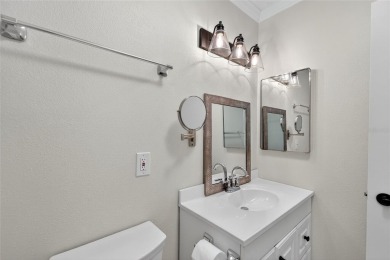 Presenting this custom-built residence overlooking the tranquil on North Lakes Golf Course in Florida - for sale on GolfHomes.com, golf home, golf lot