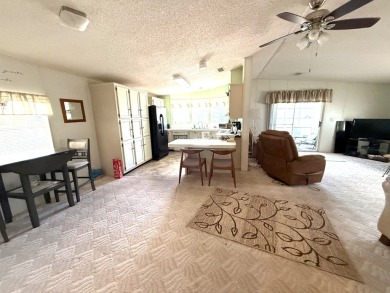 Move in ready at a great price!! This 2 bed, 2 bath home is on Whisperwood Golf Course in Florida - for sale on GolfHomes.com, golf home, golf lot