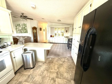 Move in ready at a great price!! This 2 bed, 2 bath home is on Whisperwood Golf Course in Florida - for sale on GolfHomes.com, golf home, golf lot