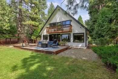 Perched along the second tee box of the Lake Almanor Country on Lake Almanor Country Club in California - for sale on GolfHomes.com, golf home, golf lot