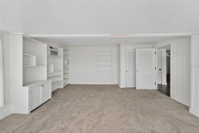 Presenting this custom-built residence overlooking the tranquil on North Lakes Golf Course in Florida - for sale on GolfHomes.com, golf home, golf lot