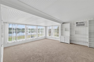Presenting this custom-built residence overlooking the tranquil on North Lakes Golf Course in Florida - for sale on GolfHomes.com, golf home, golf lot