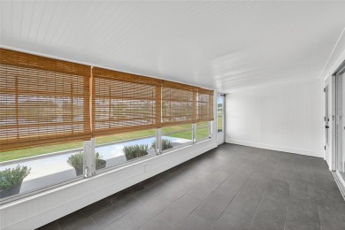 Presenting this custom-built residence overlooking the tranquil on North Lakes Golf Course in Florida - for sale on GolfHomes.com, golf home, golf lot