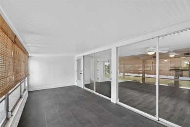 Presenting this custom-built residence overlooking the tranquil on North Lakes Golf Course in Florida - for sale on GolfHomes.com, golf home, golf lot