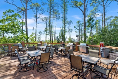 Experience breathtaking bay views and refined coastal luxury in on Sandestin Golf and Beach Resort - Raven in Florida - for sale on GolfHomes.com, golf home, golf lot