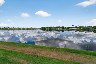 Presenting this custom-built residence overlooking the tranquil on North Lakes Golf Course in Florida - for sale on GolfHomes.com, golf home, golf lot
