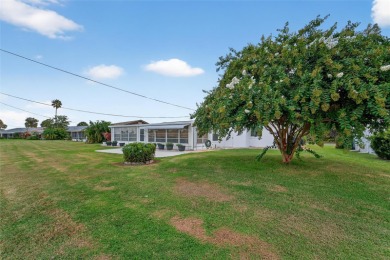Presenting this custom-built residence overlooking the tranquil on North Lakes Golf Course in Florida - for sale on GolfHomes.com, golf home, golf lot