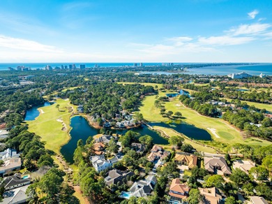 Experience breathtaking bay views and refined coastal luxury in on Sandestin Golf and Beach Resort - Raven in Florida - for sale on GolfHomes.com, golf home, golf lot