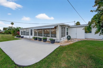 Presenting this custom-built residence overlooking the tranquil on North Lakes Golf Course in Florida - for sale on GolfHomes.com, golf home, golf lot