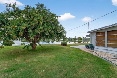 Presenting this custom-built residence overlooking the tranquil on North Lakes Golf Course in Florida - for sale on GolfHomes.com, golf home, golf lot