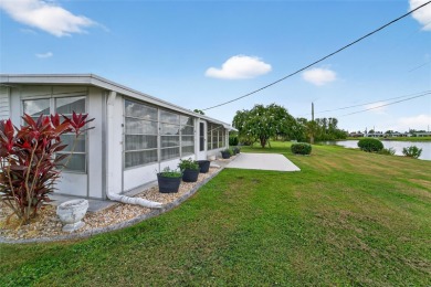 Presenting this custom-built residence overlooking the tranquil on North Lakes Golf Course in Florida - for sale on GolfHomes.com, golf home, golf lot