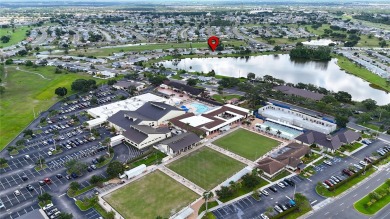 Presenting this custom-built residence overlooking the tranquil on North Lakes Golf Course in Florida - for sale on GolfHomes.com, golf home, golf lot