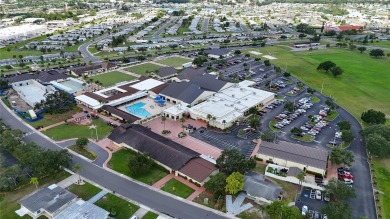 Presenting this custom-built residence overlooking the tranquil on North Lakes Golf Course in Florida - for sale on GolfHomes.com, golf home, golf lot