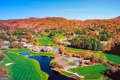 Long range mountain views possible from this wooded lot located on Sky Valley Resort and Country Club in Georgia - for sale on GolfHomes.com, golf home, golf lot
