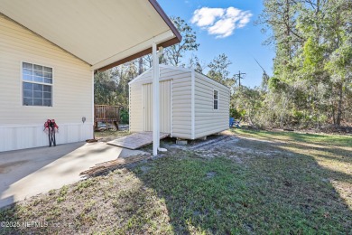 Welcome to 105 Putter Ln, a charming single-family home perfect on The Oaks Golf Club in Florida - for sale on GolfHomes.com, golf home, golf lot