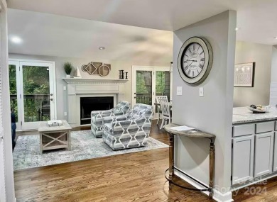 Recently renovated townhome with a bright, modern and open floor on Rumbling Bald Resort on Lake Lure in North Carolina - for sale on GolfHomes.com, golf home, golf lot