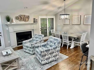 Recently renovated townhome with a bright, modern and open floor on Rumbling Bald Resort on Lake Lure in North Carolina - for sale on GolfHomes.com, golf home, golf lot