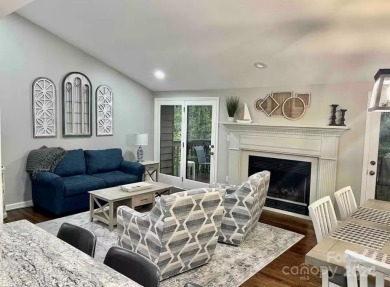 Recently renovated townhome with a bright, modern and open floor on Rumbling Bald Resort on Lake Lure in North Carolina - for sale on GolfHomes.com, golf home, golf lot