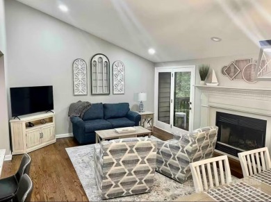 Recently renovated townhome with a bright, modern and open floor on Rumbling Bald Resort on Lake Lure in North Carolina - for sale on GolfHomes.com, golf home, golf lot