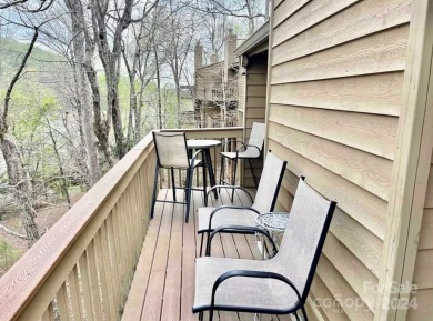 Recently renovated townhome with a bright, modern and open floor on Rumbling Bald Resort on Lake Lure in North Carolina - for sale on GolfHomes.com, golf home, golf lot