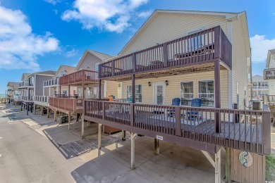 This spacious 5 Bedroom 3 Bath raised beach house is just a very on Prestwick Country Club in South Carolina - for sale on GolfHomes.com, golf home, golf lot