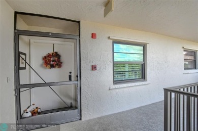 DONT MISS OUT ON THIS STUNNING RENOVATED 1900 SQ FT CORNER on Boca Dunes Golf and Country Club in Florida - for sale on GolfHomes.com, golf home, golf lot