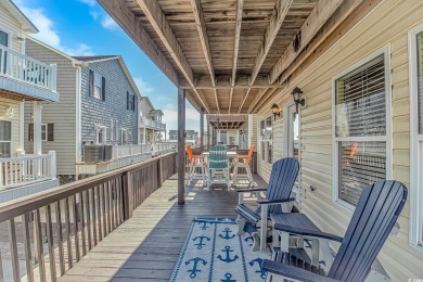 This spacious 5 Bedroom 3 Bath raised beach house is just a very on Prestwick Country Club in South Carolina - for sale on GolfHomes.com, golf home, golf lot