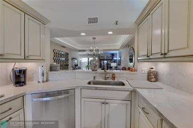 DONT MISS OUT ON THIS STUNNING RENOVATED 1900 SQ FT CORNER on Boca Dunes Golf and Country Club in Florida - for sale on GolfHomes.com, golf home, golf lot