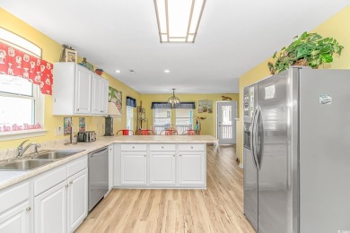 This spacious 5 Bedroom 3 Bath raised beach house is just a very on Prestwick Country Club in South Carolina - for sale on GolfHomes.com, golf home, golf lot