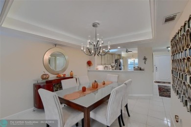 DONT MISS OUT ON THIS STUNNING RENOVATED 1900 SQ FT CORNER on Boca Dunes Golf and Country Club in Florida - for sale on GolfHomes.com, golf home, golf lot