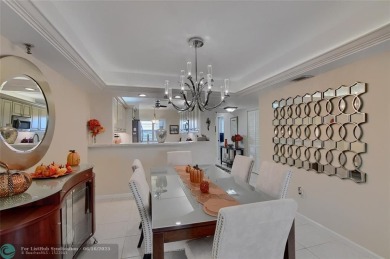 DONT MISS OUT ON THIS STUNNING RENOVATED 1900 SQ FT CORNER on Boca Dunes Golf and Country Club in Florida - for sale on GolfHomes.com, golf home, golf lot
