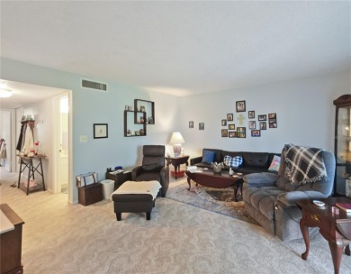 Discover comfort and convenience in this inviting 2-bedroom, 1 on Country Club At Silver Springs Shores in Florida - for sale on GolfHomes.com, golf home, golf lot
