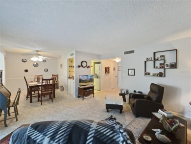 Discover comfort and convenience in this inviting 2-bedroom, 1 on Country Club At Silver Springs Shores in Florida - for sale on GolfHomes.com, golf home, golf lot