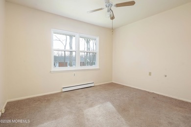 This 2-bedroom, 1-bath Upper Level Lancaster model offers a on Greenbriar Woodlands in New Jersey - for sale on GolfHomes.com, golf home, golf lot